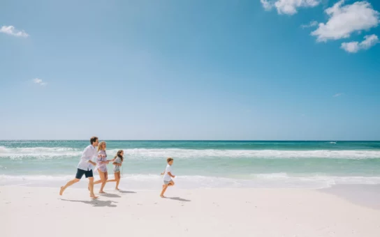Family running at the Seaside beach