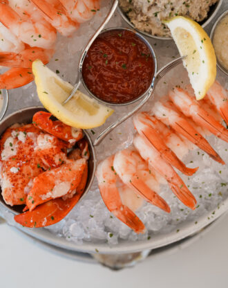 Fresh Shrimp and Oysters Served on Ice at The Shrimp Shack Restaurant in Seaside, Florida