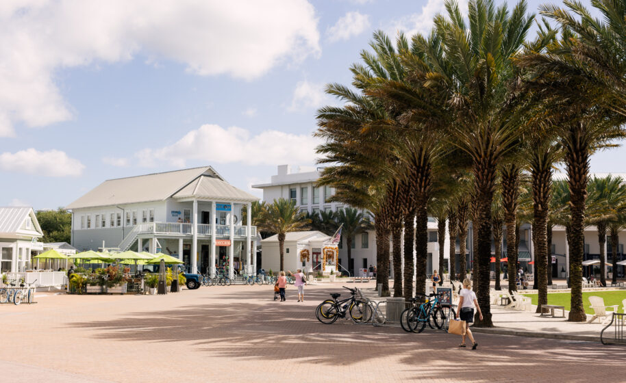 Panoramic View of Seaside Community Center: Park, Restaurant, Houses, and People Enjoying a Sunny Day in Seaside, Florida